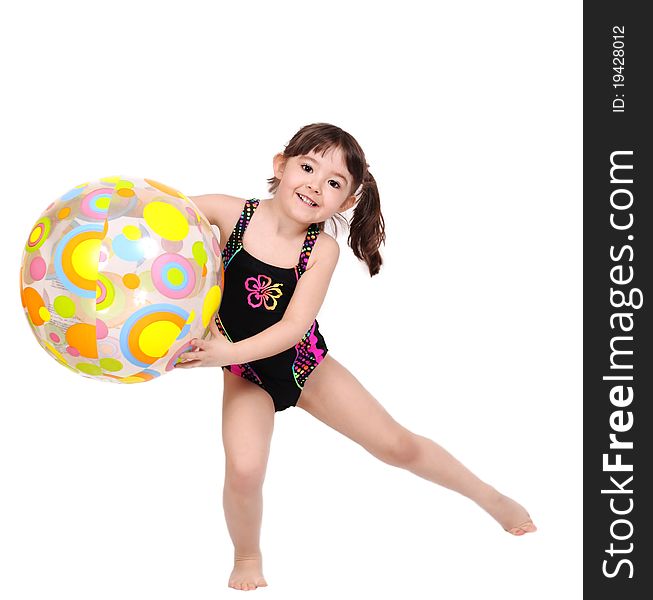 Adorable little girl in swimsuit playing with beach ball, isolated on white. Adorable little girl in swimsuit playing with beach ball, isolated on white
