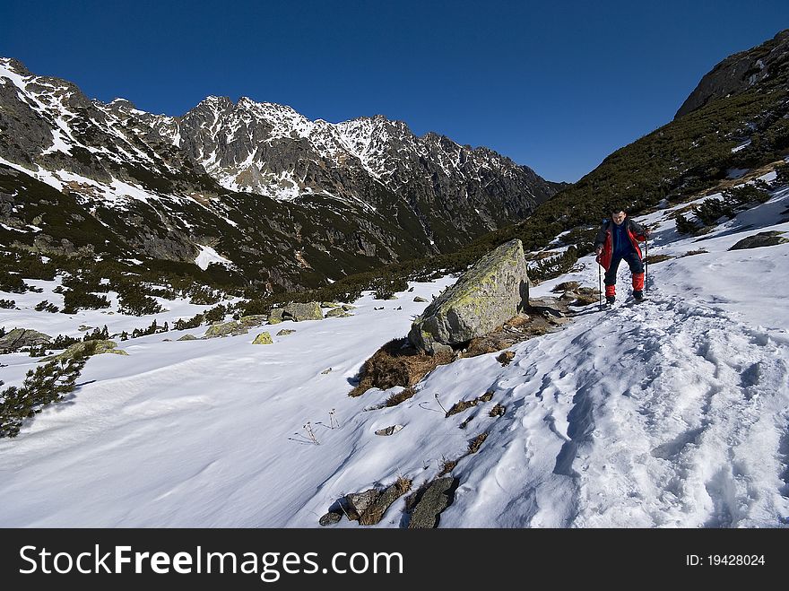 Tourist on peaks of the snowy Tatra mountains. Tourist on peaks of the snowy Tatra mountains