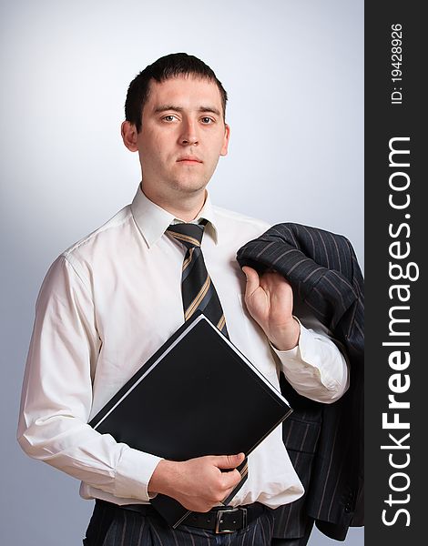 Businessman portrait in a jacket and tie