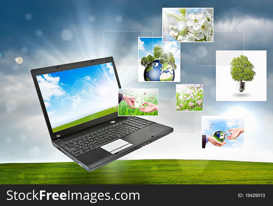 Colorful collage of laptop against green nature background. Colorful collage of laptop against green nature background