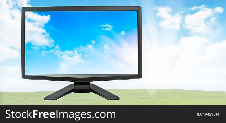 Monitor with the contrast of the display against the backdrop of nature