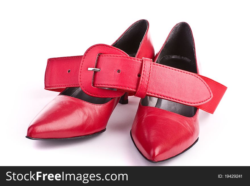 Red shoes with belt isolated on white
