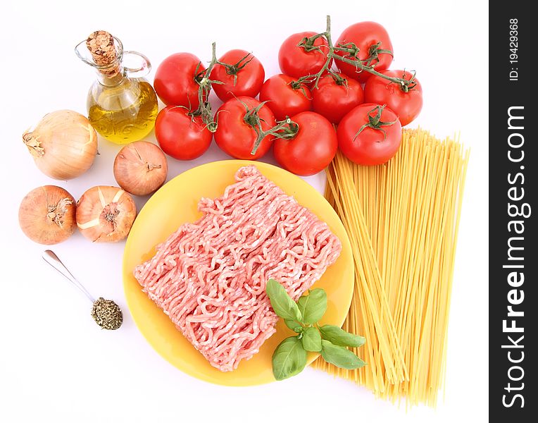 Ingredients for spaghetti bolognese on a white background. Ingredients for spaghetti bolognese on a white background