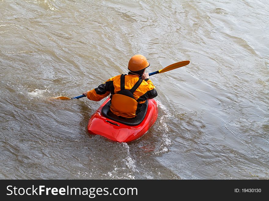 Man in kayak on calm water. Man in kayak on calm water