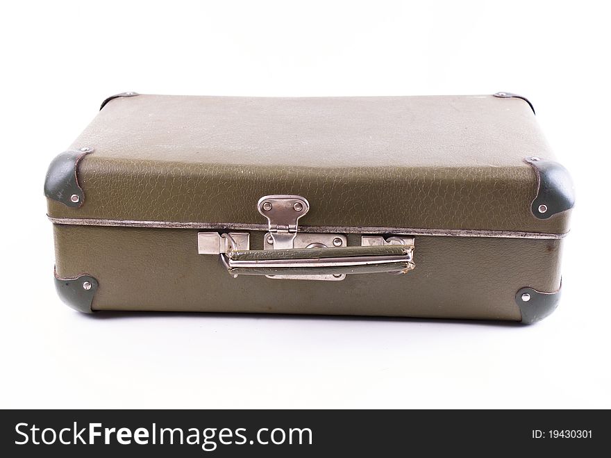 Battered old suitcase in studio on white background
