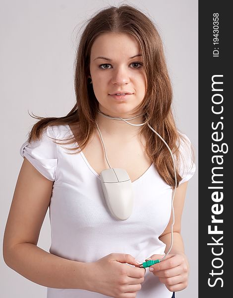 Girl with a computer mouse in the neck