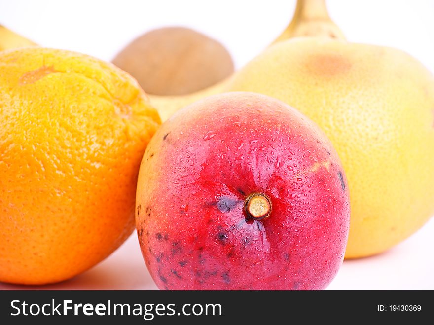 Mix of tropical fruit and vegetable on white background. Mix of tropical fruit and vegetable on white background