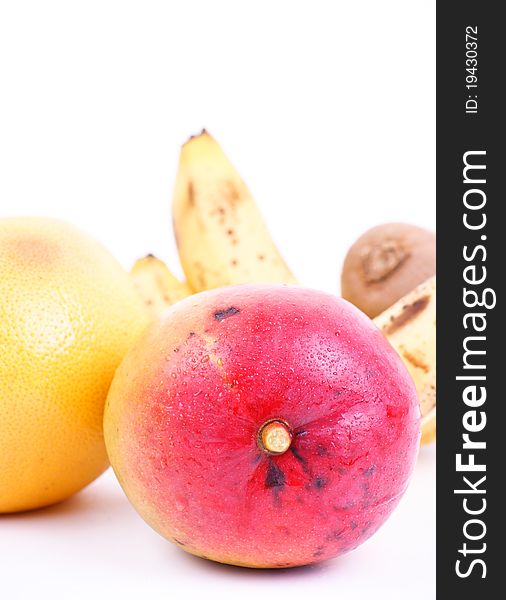Mix of tropical fruit and vegetable on white background. Mix of tropical fruit and vegetable on white background