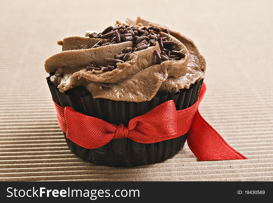 Lovely fresh chocolate cupcake - very shallow depth of field