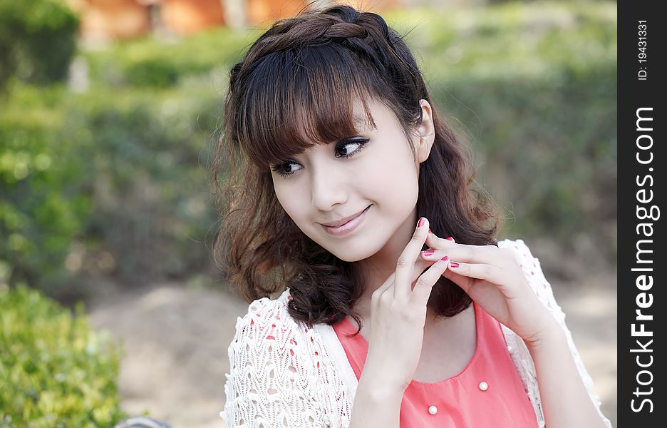 Young Asian woman outdoor portrait.