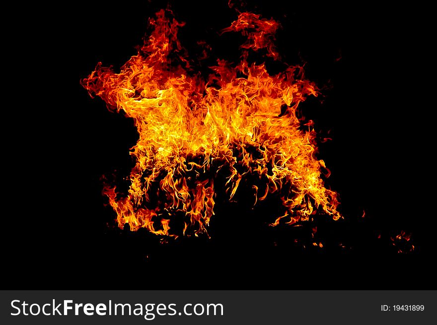 Fire with a dark background. Fire with a dark background