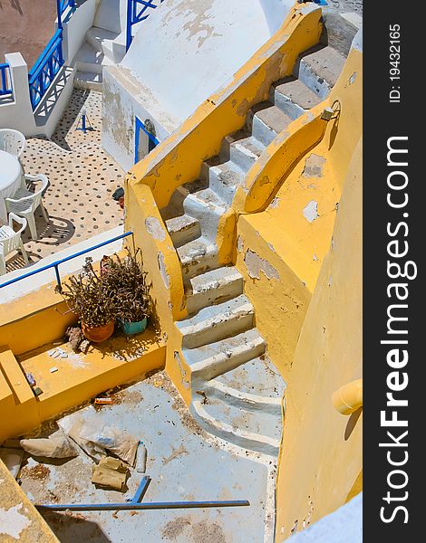 Colorful old staircase and traditional architecture on island of Santorini in Fira, Greece. Colorful old staircase and traditional architecture on island of Santorini in Fira, Greece.