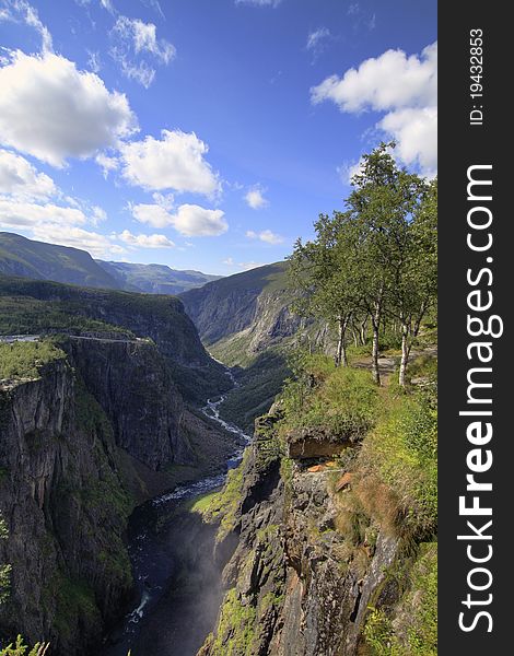 Panoramic view over a river in the Hardanger Fjord area, Norway. Panoramic view over a river in the Hardanger Fjord area, Norway.