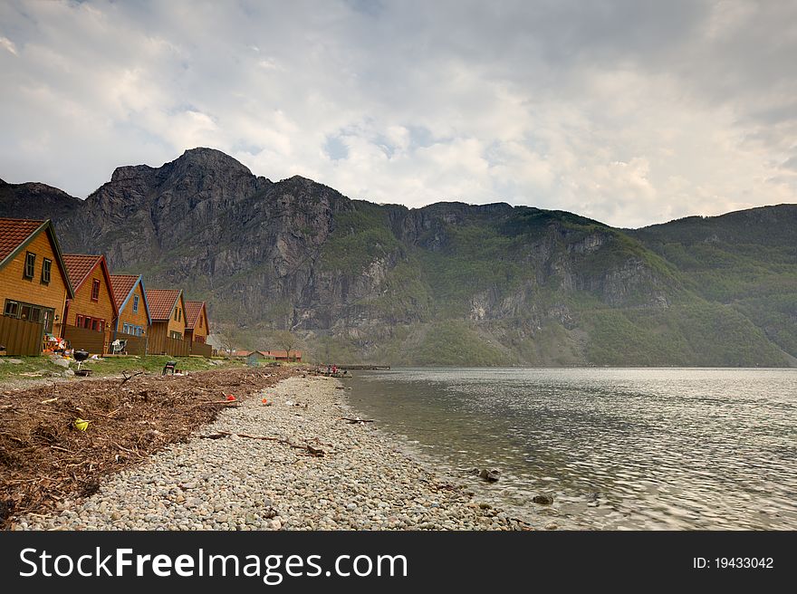 Panoramic view over a fjord shore in southern Norway