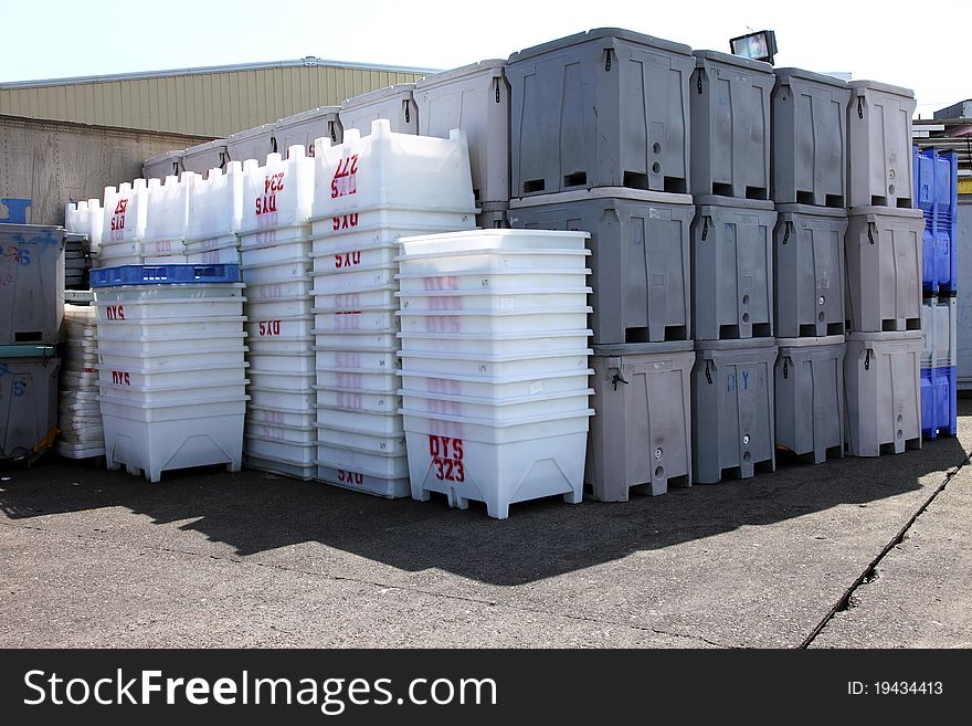 Plastic totes organized for the next load of catch. Plastic totes organized for the next load of catch.