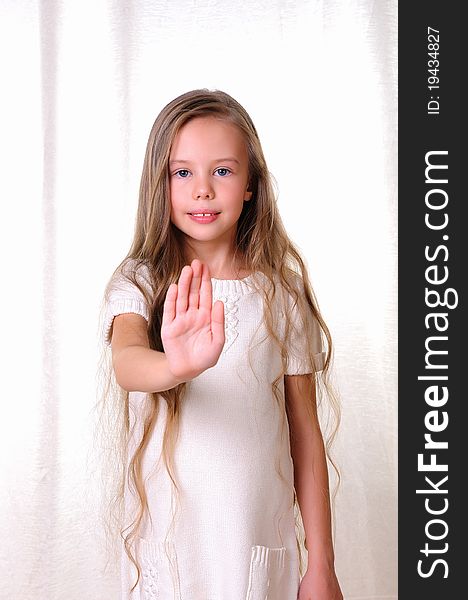 Portrait of a young beautiful girl. Girl various hand gestures.