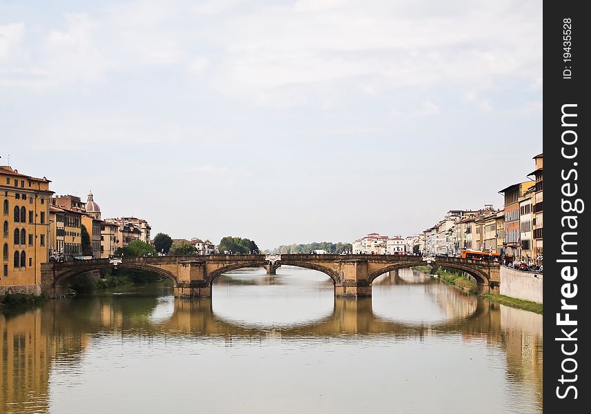 Reflection of Arno river and Ponte alle Grazie Bridge Firenze , Florence - Italy. Reflection of Arno river and Ponte alle Grazie Bridge Firenze , Florence - Italy