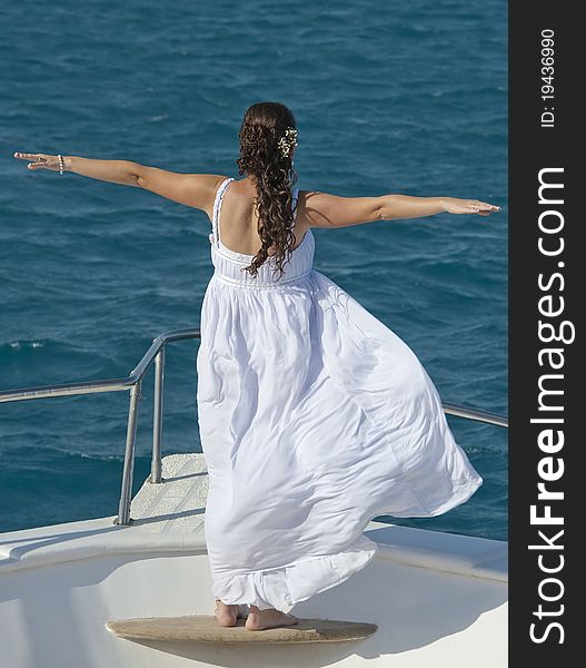 Bride on the bow of a boat