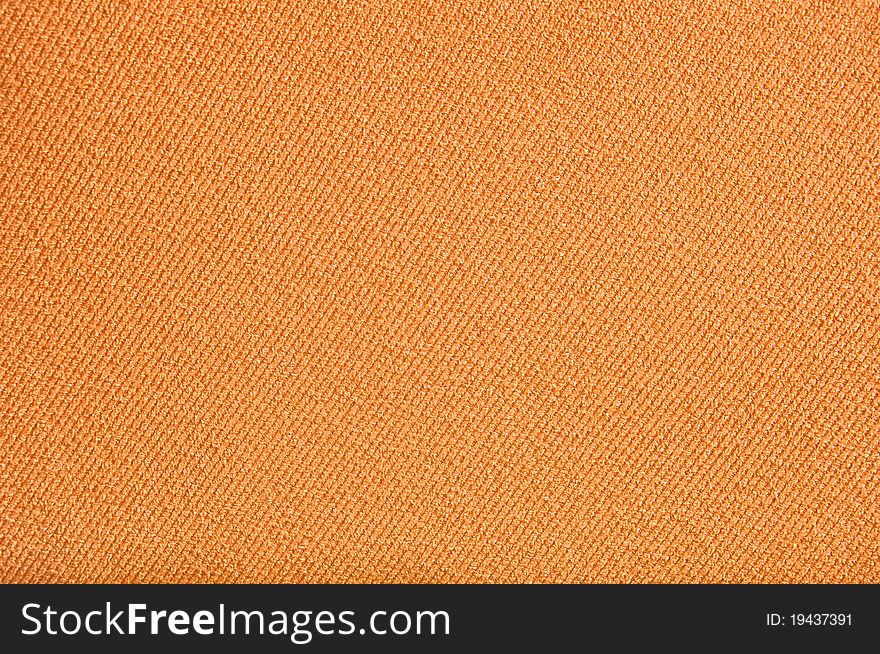 Weaving background of orange fabric. Weaving background of orange fabric