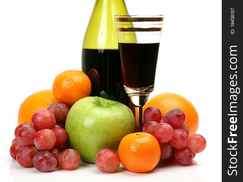 Wine and fruit on a white background