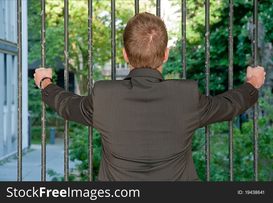 Portrait of a young prisoner business man