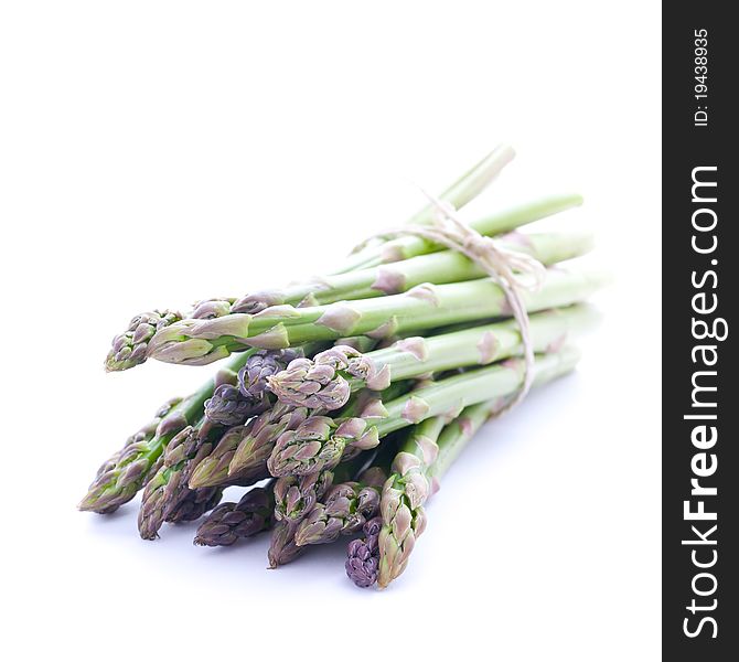 Green asparagus isolated on white background