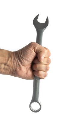 Hand With Wrench Stock Photos