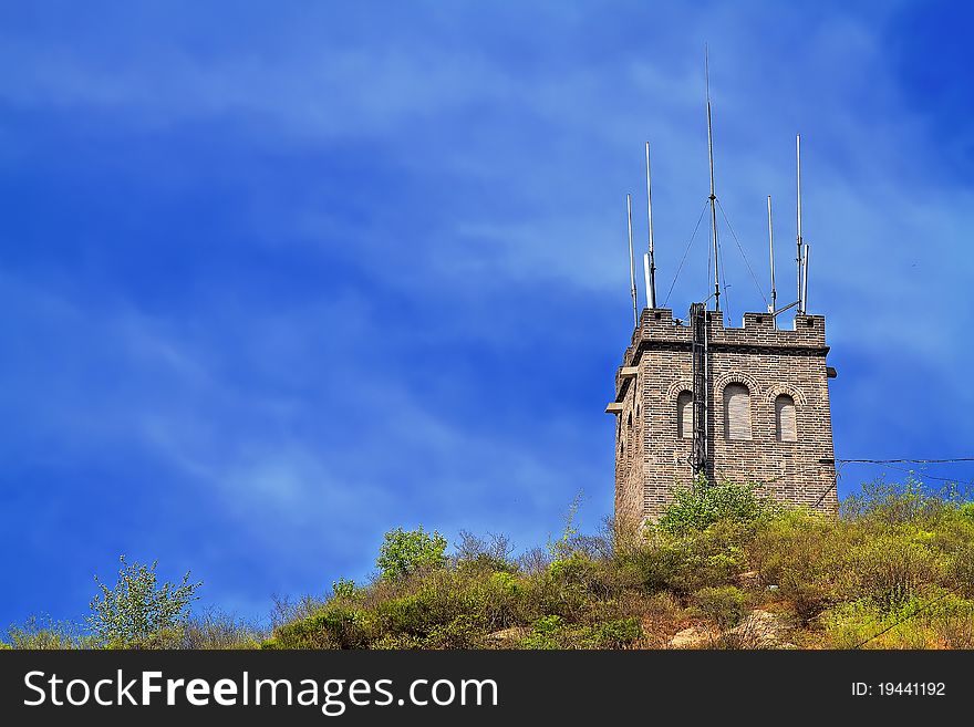 Tower On A Moutain Under The Blue