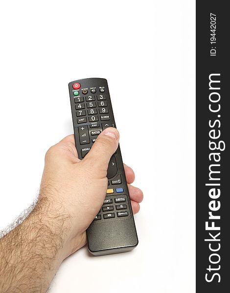 Male hand holding remote control isolated on white
