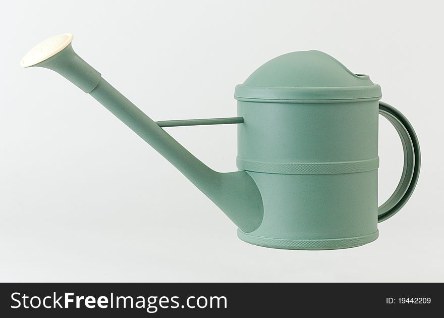 Nice green watering can good for your gardening an image isolated. Nice green watering can good for your gardening an image isolated