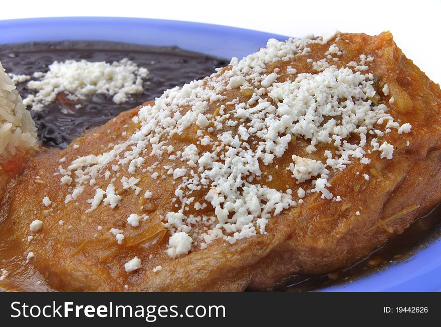 Closeup of crumbled Mexican cheese on chile relleno