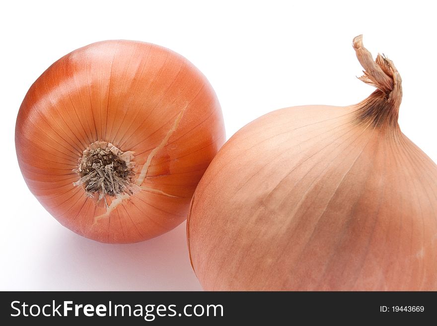 Two onions isolated on white