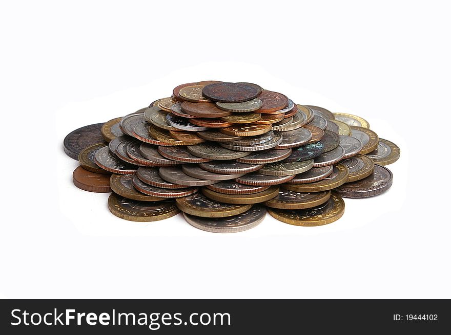 A pile of coins isolated on white background