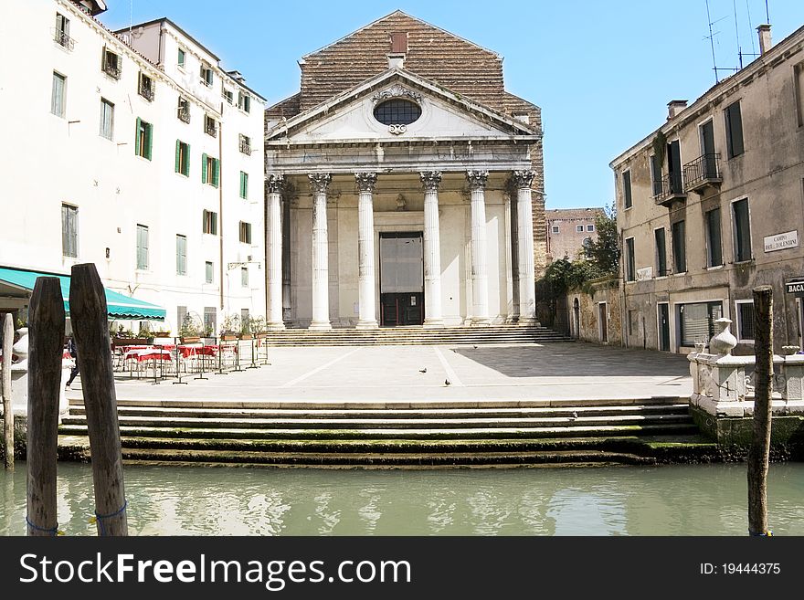 Church behind a canal in venice