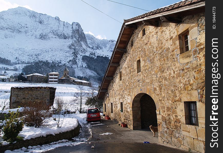 Typical Basque country farmhouse in winter time in Atxondo