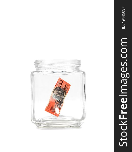 An empty money jar against a white background. An empty money jar against a white background