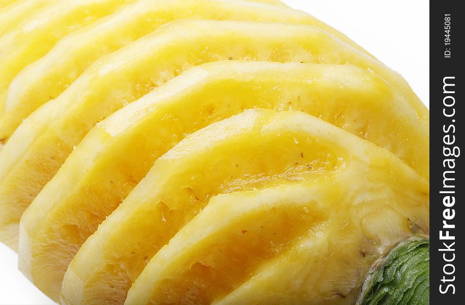 Close-up of the peeled pineapple on white. Close-up of the peeled pineapple on white.
