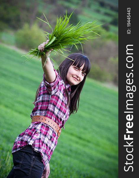 Girl in green field