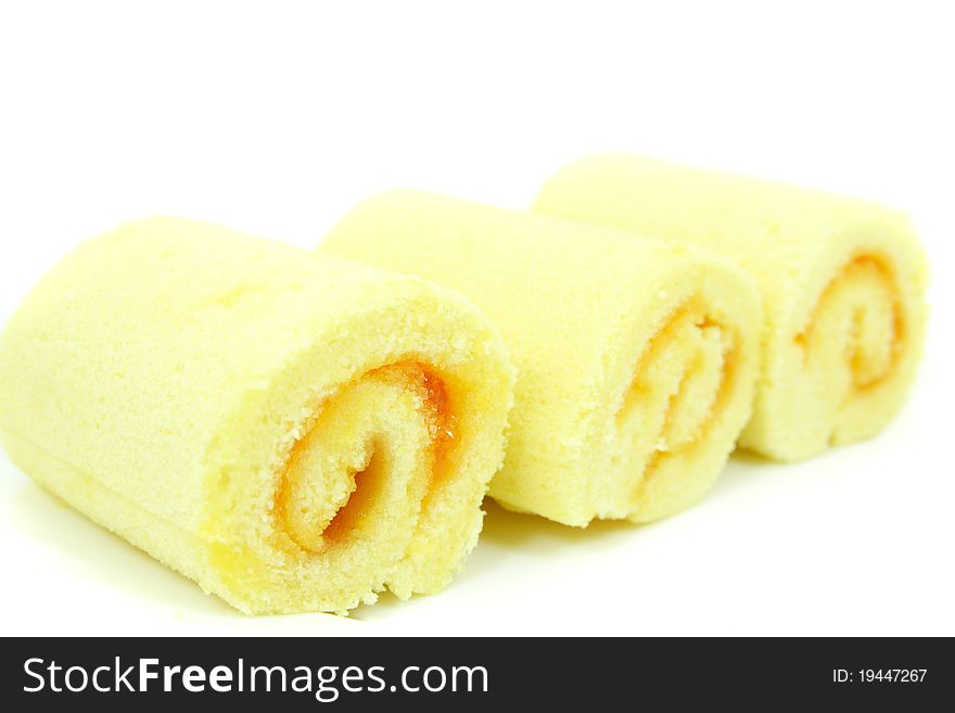 Orange Rolls cake isolated on white background