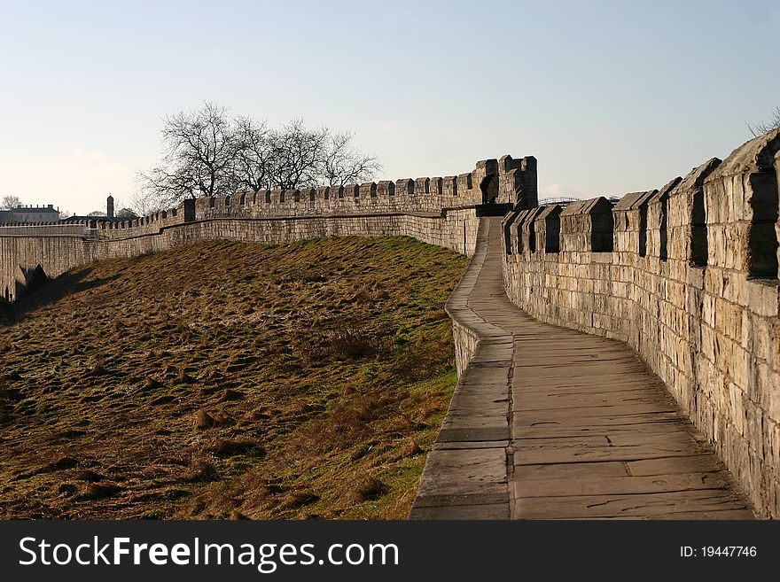 View of a stretch of the city wall of york, england, on a clear winter day. View of a stretch of the city wall of york, england, on a clear winter day