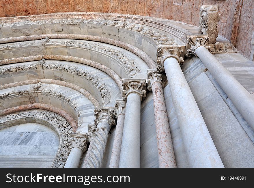 White marble columns and archway