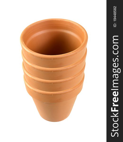 A clay pot isolated against a white background. A clay pot isolated against a white background