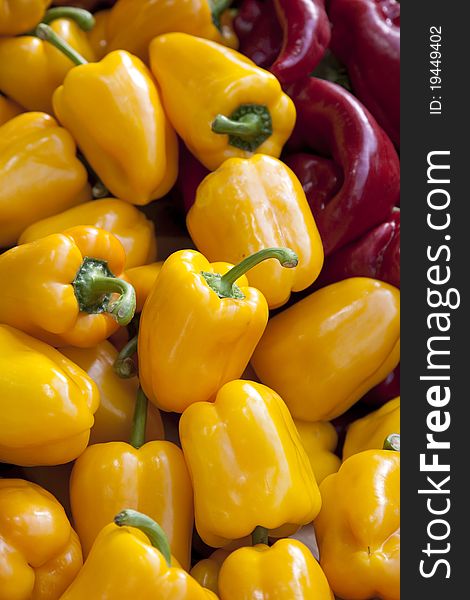 Red and Yellow Peppers for sale on Market Stall. Red and Yellow Peppers for sale on Market Stall