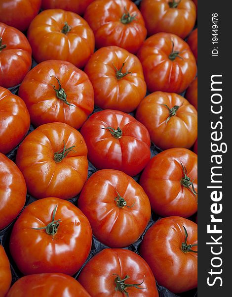 Close up of Tomatoes for sale on Market Stall. Close up of Tomatoes for sale on Market Stall