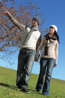 Young Couple Walking Royalty Free Stock Photography Young Couple Walking Royalty Free Stock Photography
