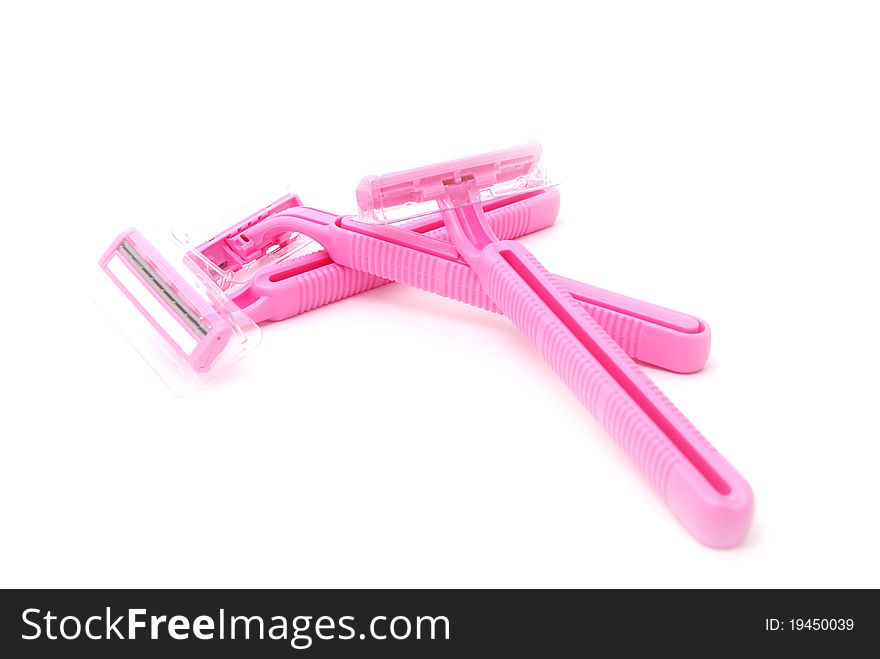 Pink safety razors for women. Isolated on white