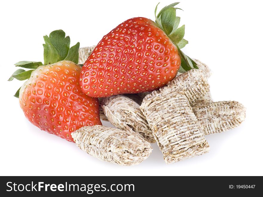 Wheat cereal with strawberries over white background - isolated. Wheat cereal with strawberries over white background - isolated