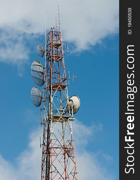 Telecommunication mast with sky background