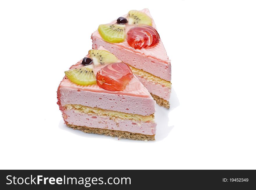 Magnificent cake with a different stuffing on a white background
