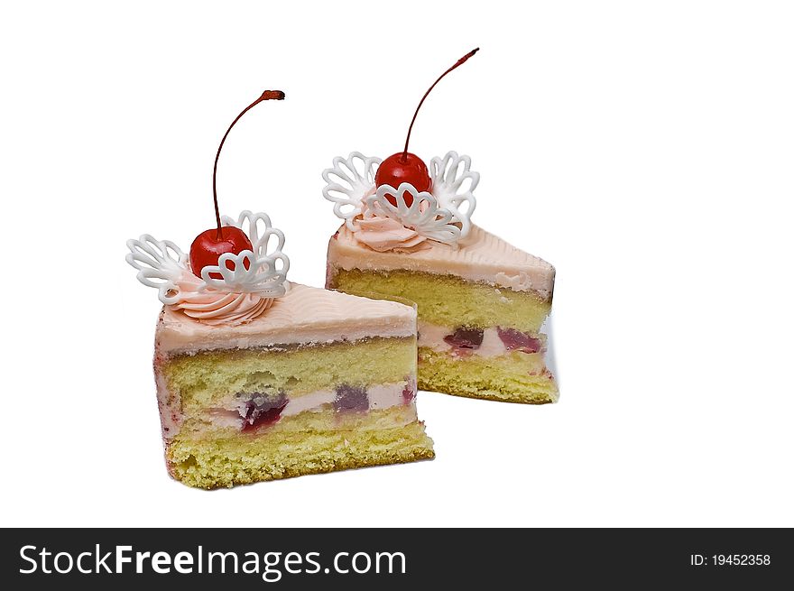 Magnificent cake with a different stuffing on a white background